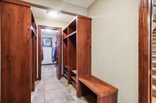 Back entry mud room offers cubbies and large closet to help keep everything orderly and in its place