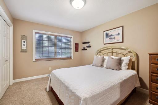 Three additional upper level bedrooms all offering nice sized closets with organizational components