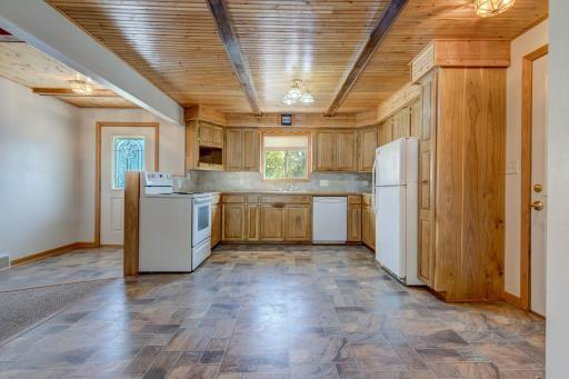 Stunning woodwork and cabinetry create a cozy environment