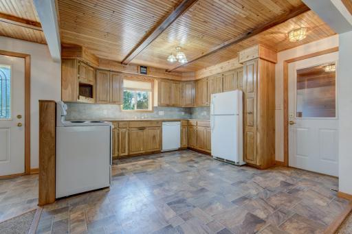 Directly inside the entryway is access to the kitchen - perfect for those big grocery trips