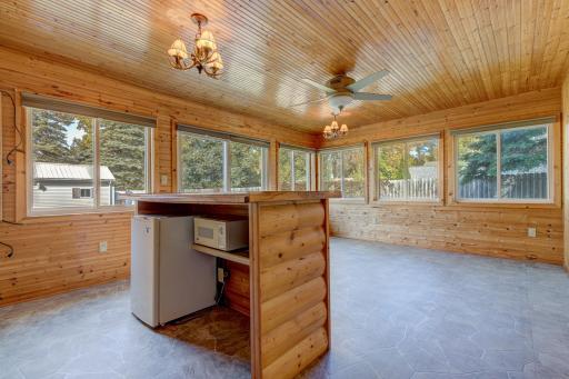 A bright sun room will be your favorite place to relax in the natural light and take in the outdoor views