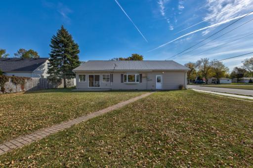 View of the back of the home from the backyard