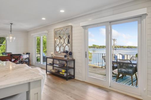 Double patio doors too the deck for optimal lake views!