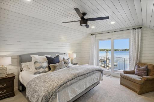 Master suite with a balcony and big water views