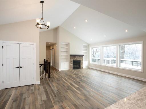 The hardwood floors across the main level are 3/4 inch solid oak with a durable factory applied custom finish.