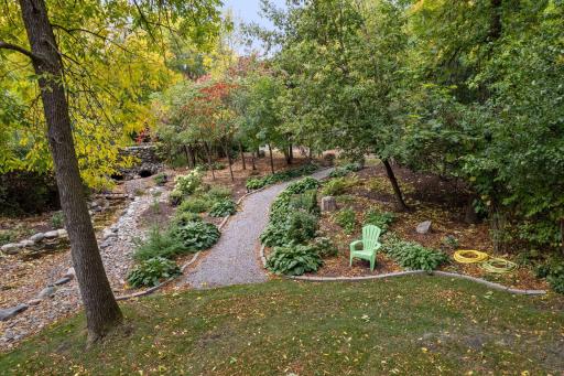Enjoy a park-like setting with strolling paths, stream and perrenial gardens.