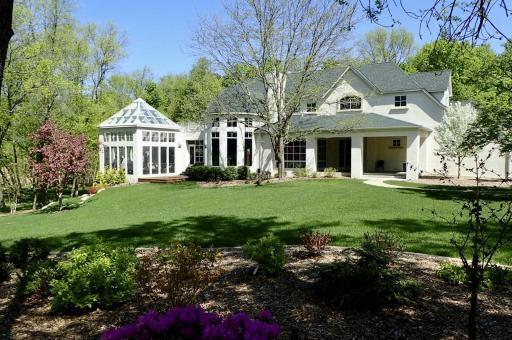 colorful flowering shrubs & perennials frame the grounds