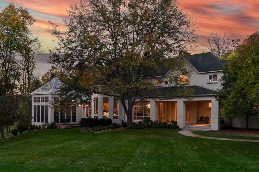 large windows throughout, glass domed screened porch/spa (on the left) - a great space for entertaining -
