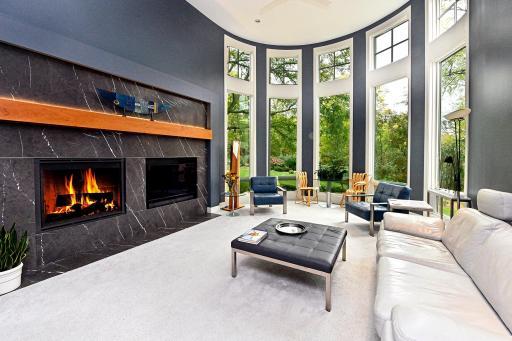 living room, 14 ft. ceiling, curved wall of glass, key upper windows are operable/motorized