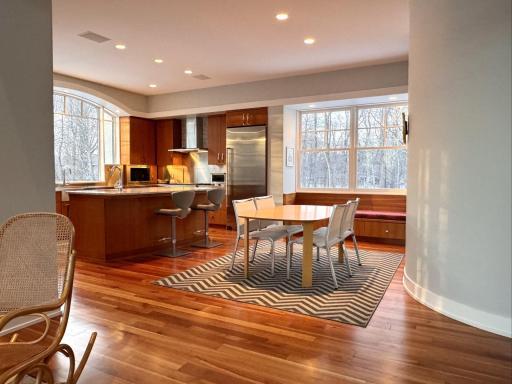 open flow from in-kitchen dining to living room