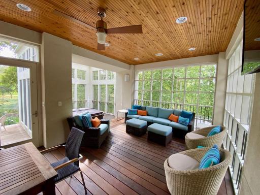 expansive porch entertaining area with pool access
