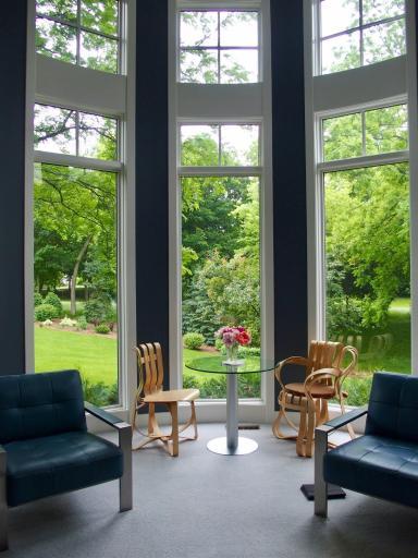 huge curved wall windows lend superb light/views