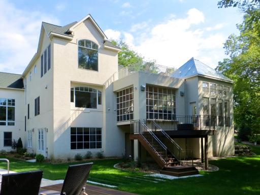 another garage behind steps for pool/yard supplies
