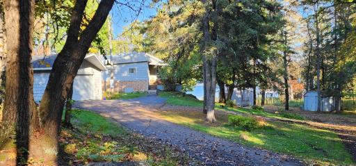 Curb appeal-detached garage and storage sheds