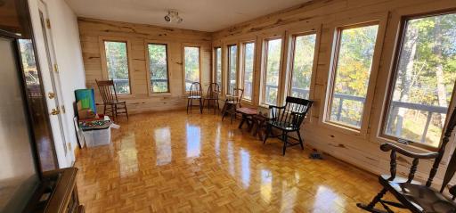Wonderful three season porch with natural light galore.