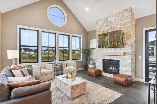 Main floor Hearthroom w/heated floors & gas fireplace