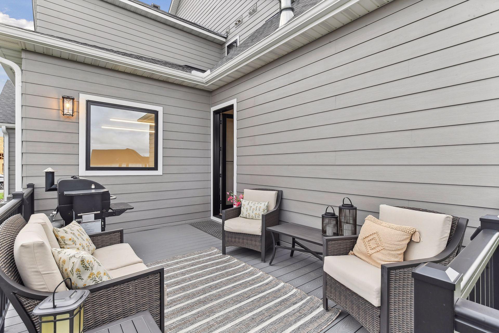 Grill deck off Hearthroom to backyard patio