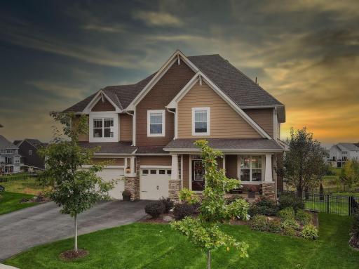 Stunning Robert Thomas built home nestled on a large fenced-in lot O'looking a pond.