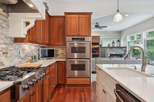 The Kitchen has been updated with new quartz countertops and a tiled backsplash.