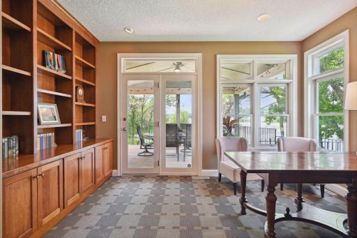 Tucked away behind a set of French doors is the main level Home Office. Perfect for working from home, the office enjoys a private door to the veranda.