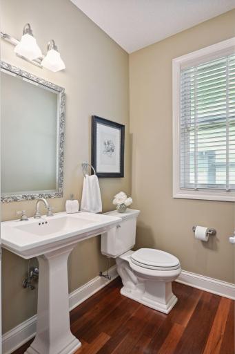 Featuring Kohler fixtures, the Powder Room is great for guests and visitors.