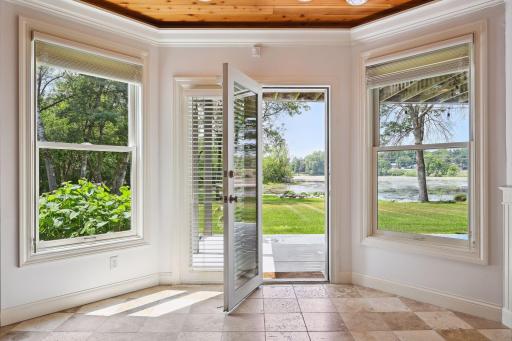 Walk out to the patio and enjoy easy access to the lakeshore!