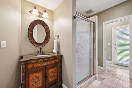 With a door to the lower level patio, the 3/4 Bathroom is a convenient feature if you are enjoying the day on the lake. The room includes a mud room with a built-in bench and hooks for towels.