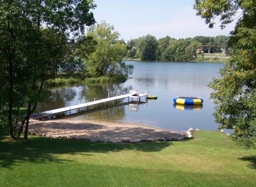 The sellers had a dock and maintained a beach on the lakeshore when there kids were little.