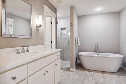 Full primary bath with walk in shower and duel vanities