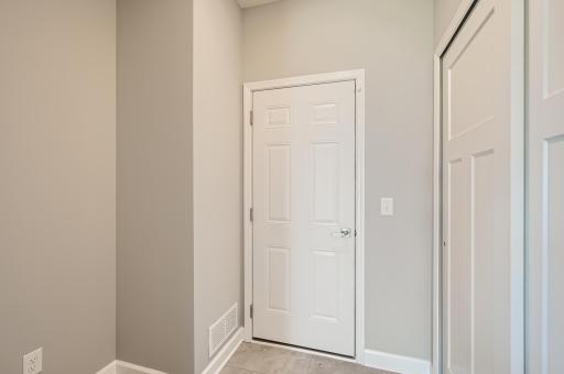 Mudroom right off the garage entrance with plenty of storage room. Finishes will vary