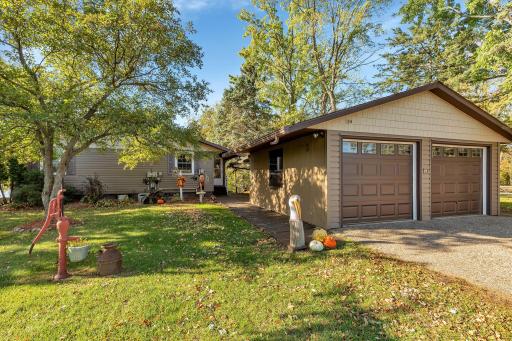 Lake life is calling you home to this charming lakeshore home/cabin on the Horseshoe Chain of Lakes