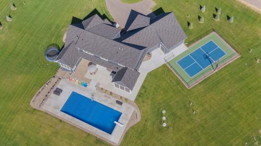 Features a dreamy pool and outdoor sport court