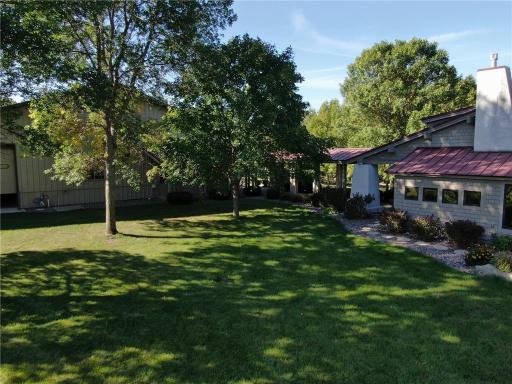 Covered walkway from the house to the indoor riding arena.