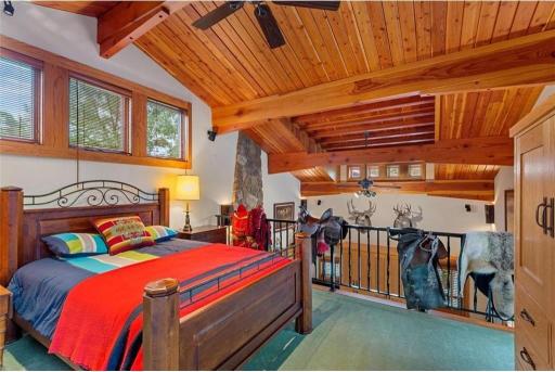 Upper level loft suite with private full bathroom.