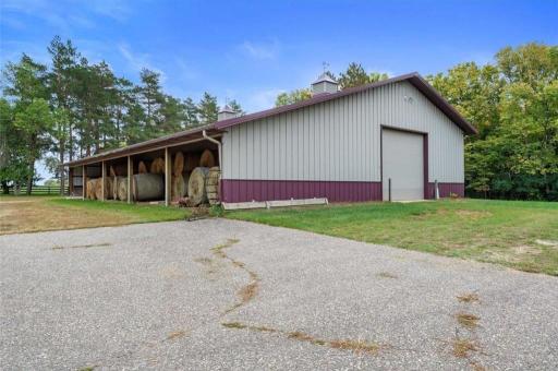 The expansive 40' x 70' outbuilding w/15' x 70' lean-to is a dream come true for horse enthusiasts, hobbyists, or anyone in the need of substantial storage space.