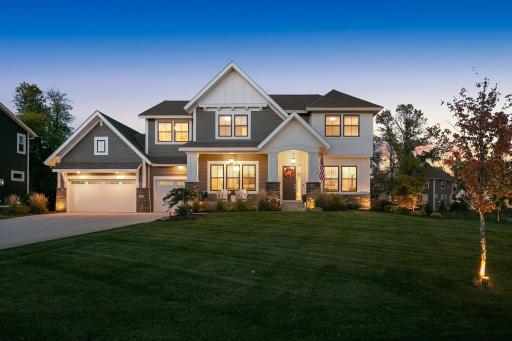 Get ready to be captivated by this flawlessly designed custom home situated on an exceptional 0.43-acre corner lot in the highly desirable Minnetonka Country Club community.