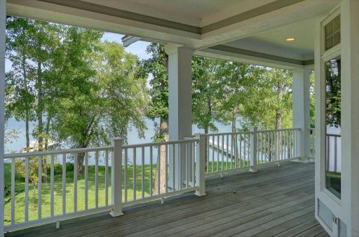 Covered upper deck for outdoor dining above Bear Trap Lake
