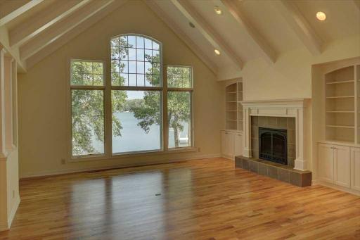 For the cooler nights you'll love warming up by the gas fireplace as you gaze through these grand picture windows
