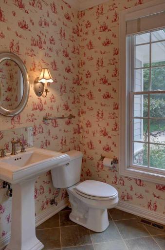 Main floor half bath is brimming with charm