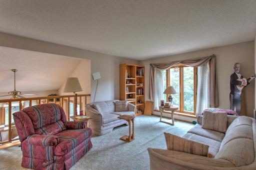 cozy upper living room, looks over dining area