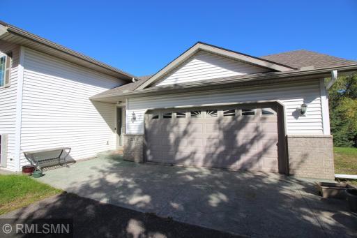 The extended apron from the garage also creates a front patio area on the front of the home for a spot to enjoy this quiet neighborhood.