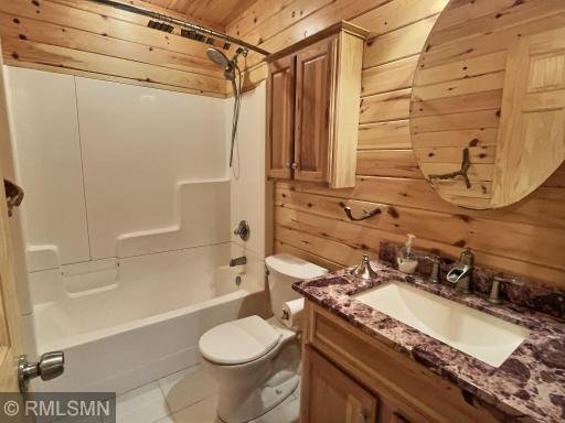 Here is the full lower level bath and that is located in the primary bedroom.