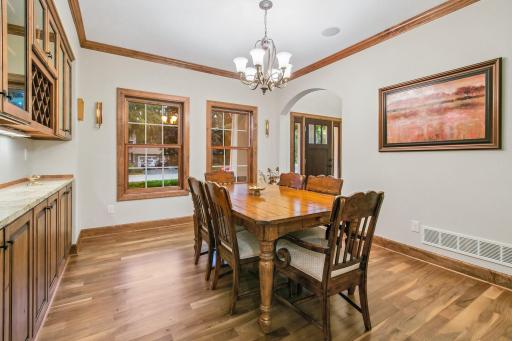 Formal Dining room with surround sound, walnut hardwood floors....