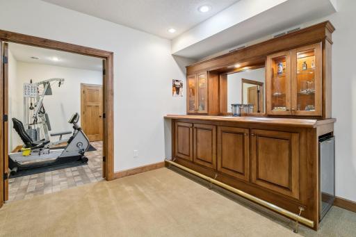 Custom built bar adjacent to Billiard room and the Amusement room