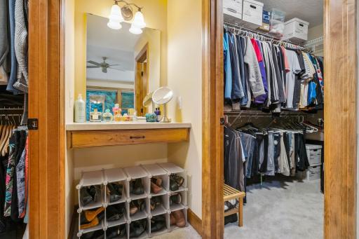 Dressing table between primary bedroom closet...one closet