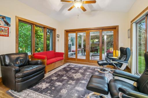 Windows on the side, patio door lead to paver patio OR... the 3++ season porch