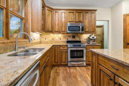 Walnut hardwood floors, stainless steel appliances