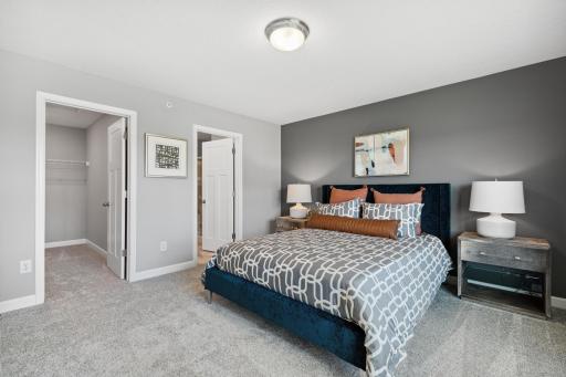 Find your retreat in this stunning owner's suite. Enjoy the exclusivity of a private bath and huge walk in closet. *Photos are of another home, some features and colors may vary.