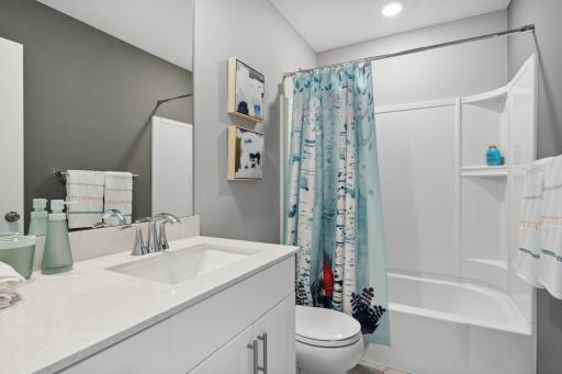 The spacious upper level bath provides plenty of space for everyone to get ready in the morning. *Photos are of another home, some features and colors may vary.
