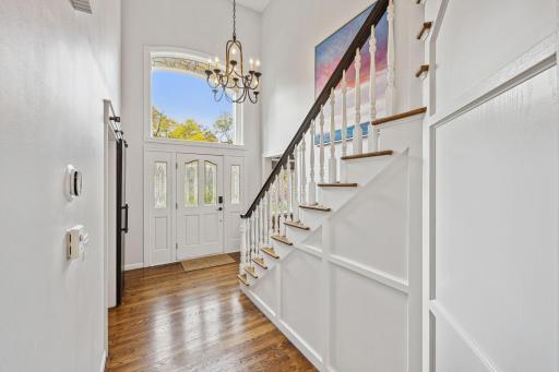Great light in the foyer with large window above entry door.